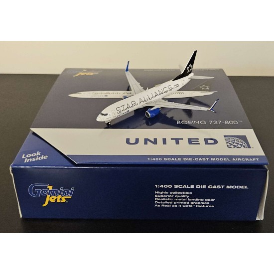 GEMINI 1/400 UNITED AIRLINES B737-800W N76516 STAR ALLIANCE GJUAL2312 - CREASED