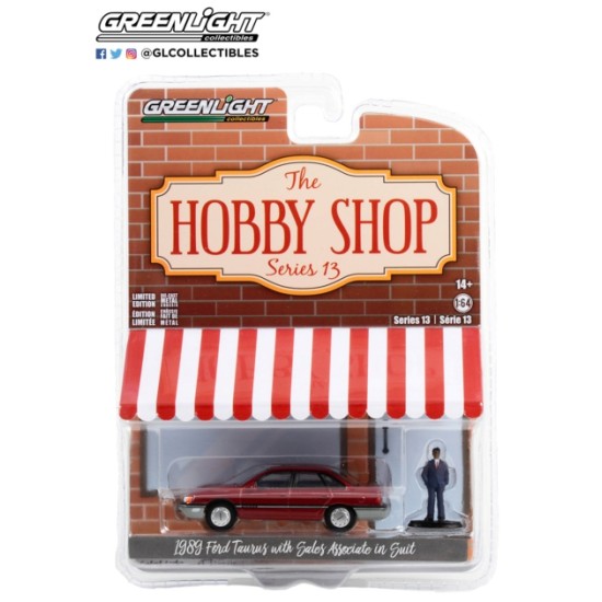 1/64 THE HOBBY SHOP SERIES 13 1989 FORD TAURUS WITH SALES ASSOCIATE IN SUIT